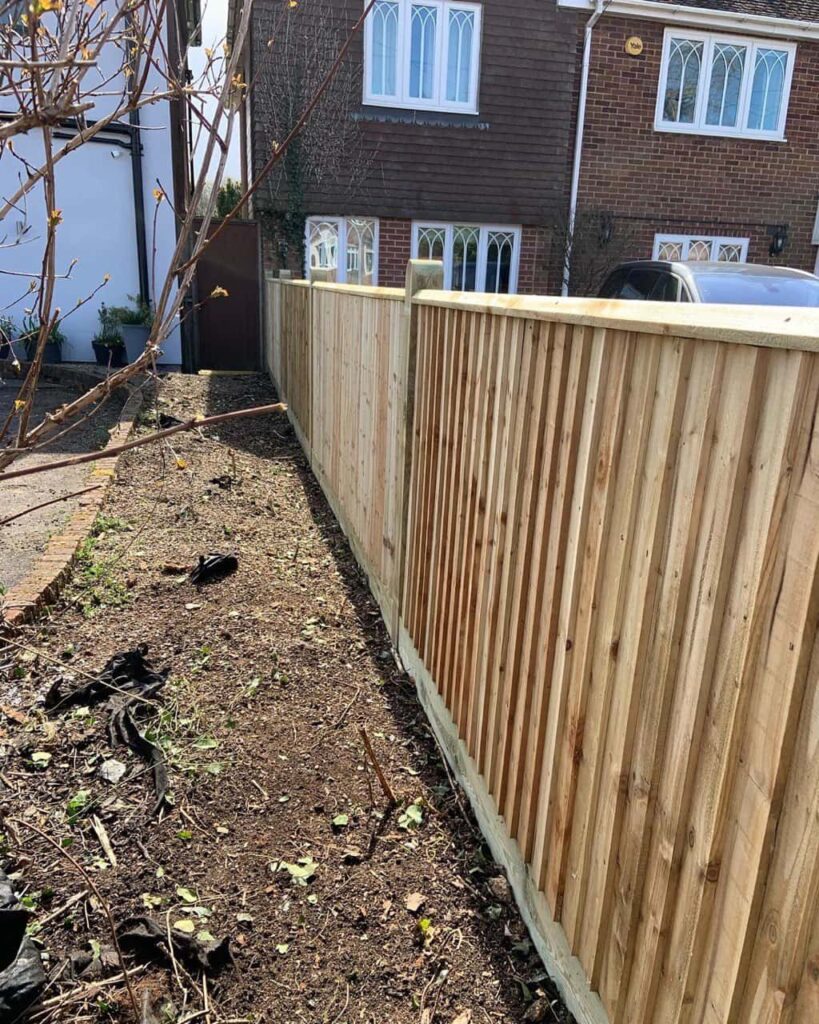 This is a photo of feather edge fencing installed in a residential property by Fast Fix Fencing March